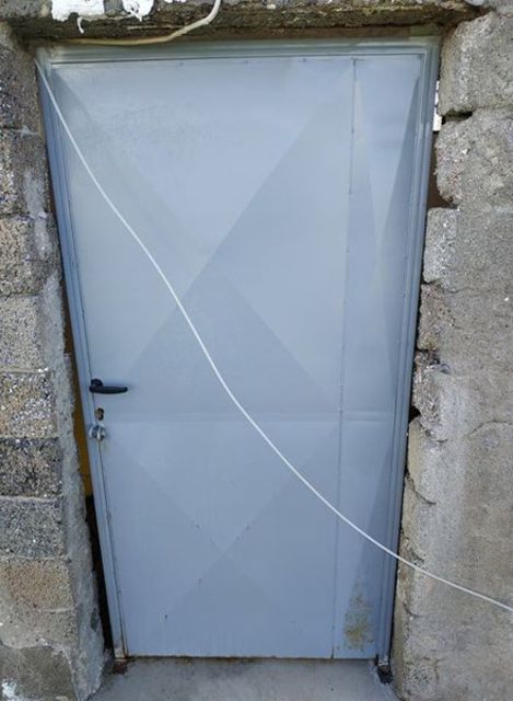 Φωτογραφία Αντικατάσταση πόρτας οικίσκου υδραγωγείου Ζερβοχωρίου.